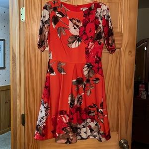 Knee length pleated dress